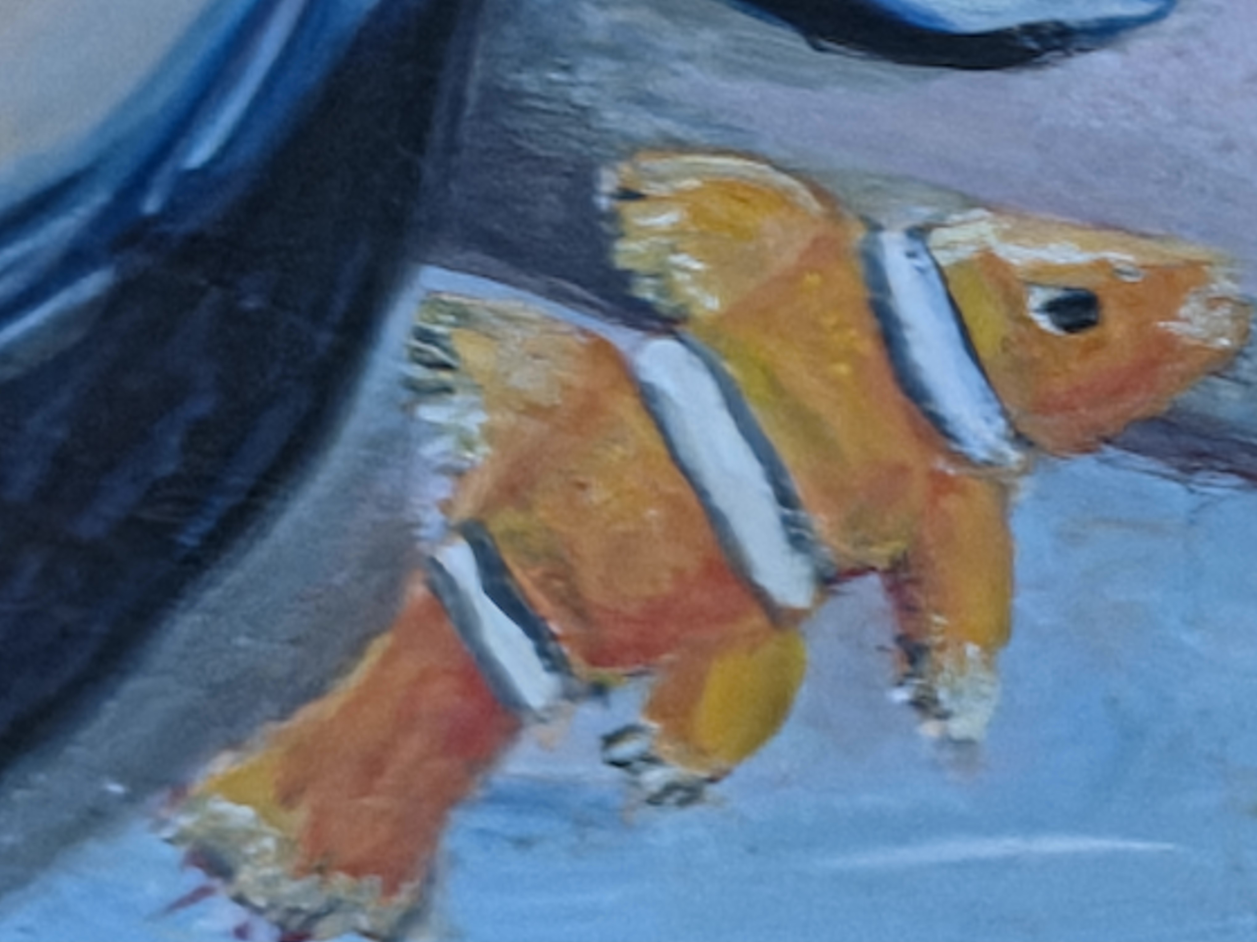 Close detail of orange fish in an oil painting.